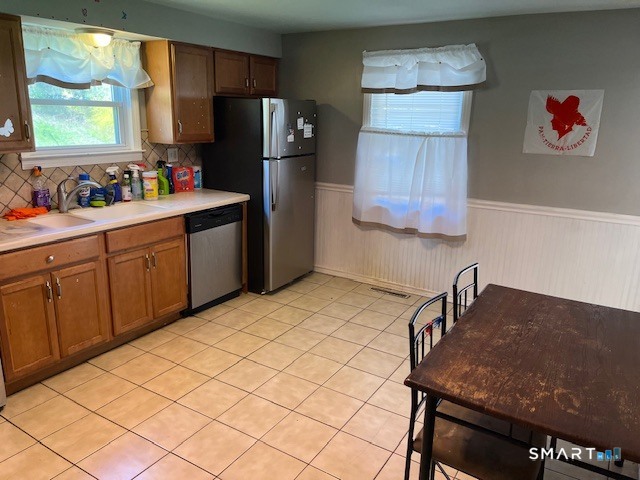 6 Cricket Drive Meriden, CT 06450 - Photo 20 of 33 a kitchen with a refrigerator and a sink