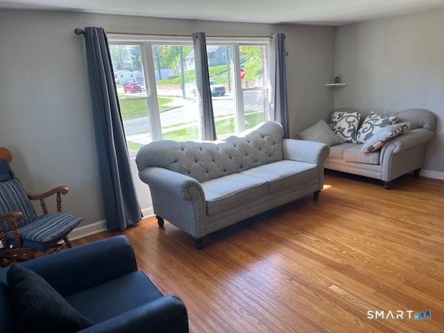 6 Cricket Drive Meriden, CT 06450 - Photo 8 of 33 a living room with furniture and a large window
