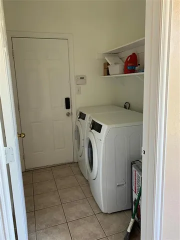 a kitchen with a cabinets and an oven
