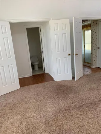 a bathroom with a shower and a mirror