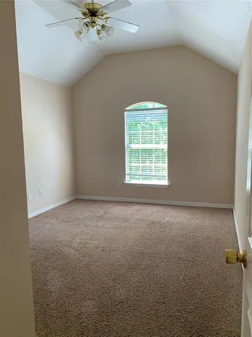 a view of a roof deck with a backyard