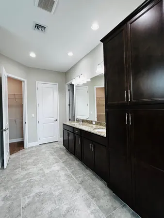 a view of a room with racks on the wall