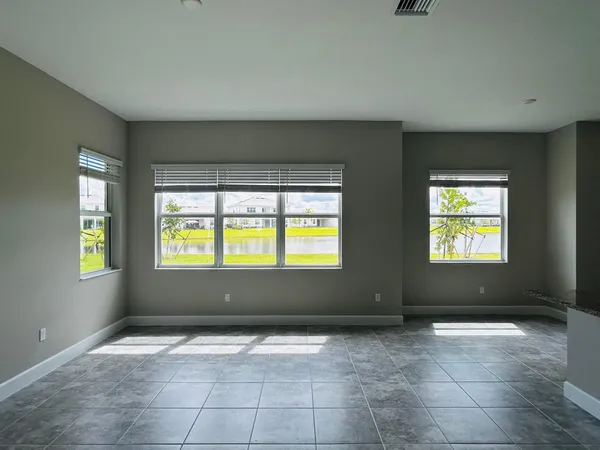 a kitchen with stainless steel appliances a sink and a refrigerator