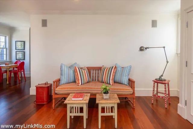 a bedroom with a large bed and a couch