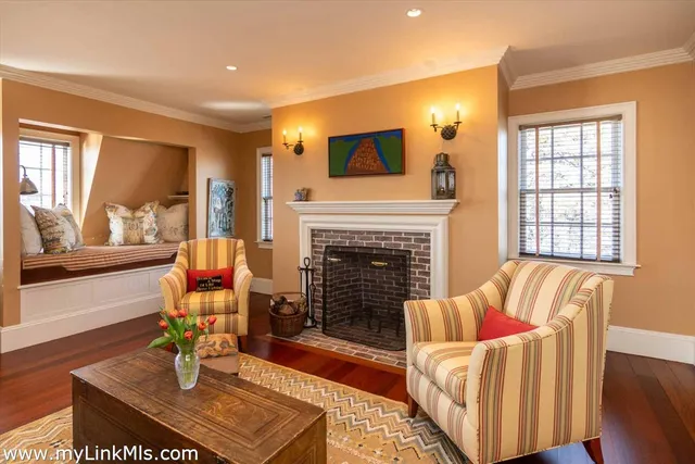 a bathroom with a granite countertop sink a mirror and a shower