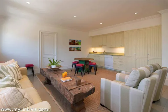 an aerial view of a house with yard swimming pool and outdoor seating