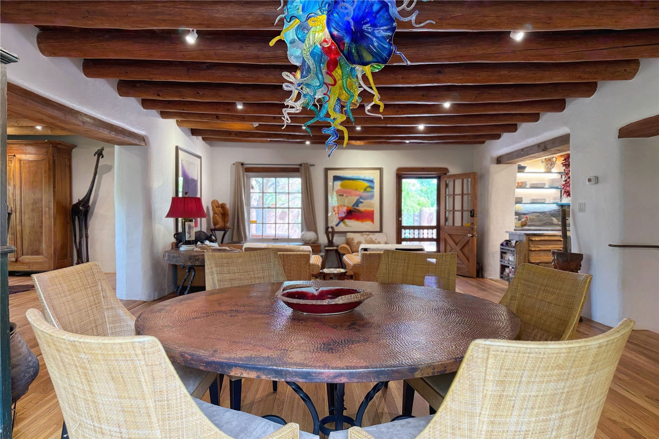 1352 Bishops Lodge Road Santa Fe, NM 87506 - Photo 22 of 66 main house dining, looking towards front door