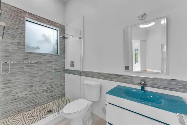 a large room with a table and chairs