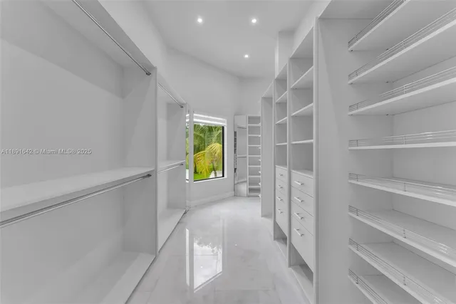 a kitchen with cabinets and sink