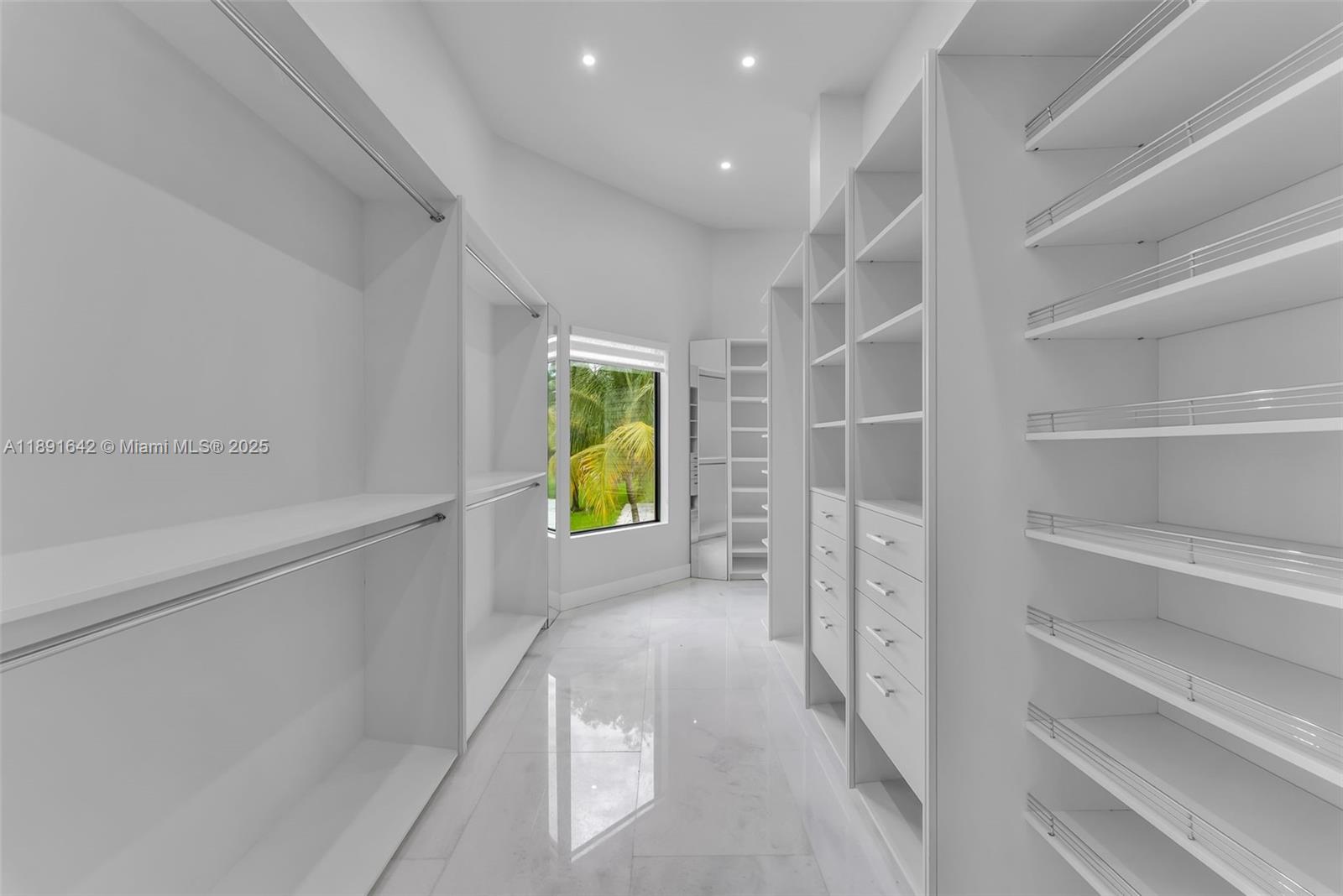 12175 Southwest 45th Street Miami, FL 33175 - Photo 22 of 58 a view of a hallway with wooden shelves