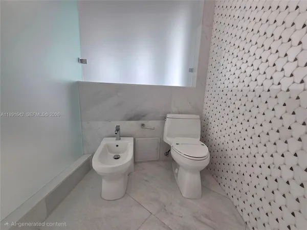 a large bathroom with a granite countertop sink and a mirror