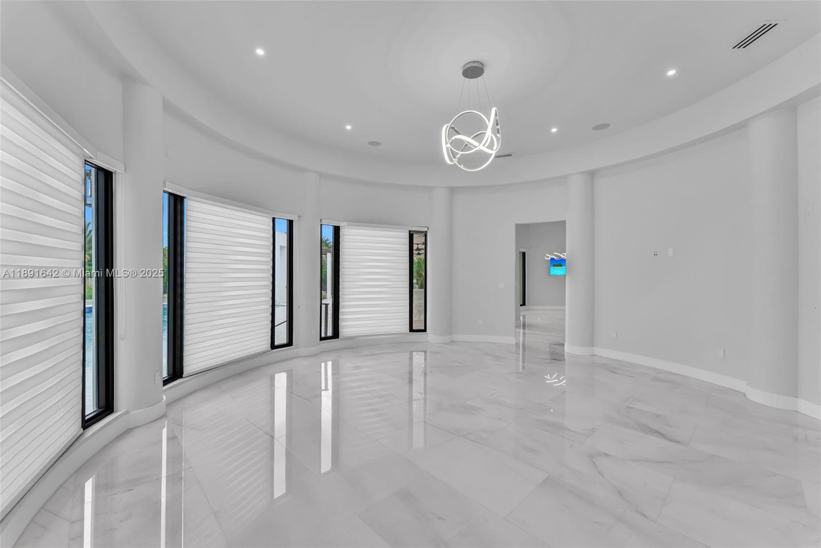 12175 Southwest 45th Street Miami, FL 33175 - Photo 29 of 58 an empty room with windows and closet