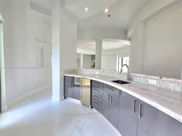 a room with a bed and a window