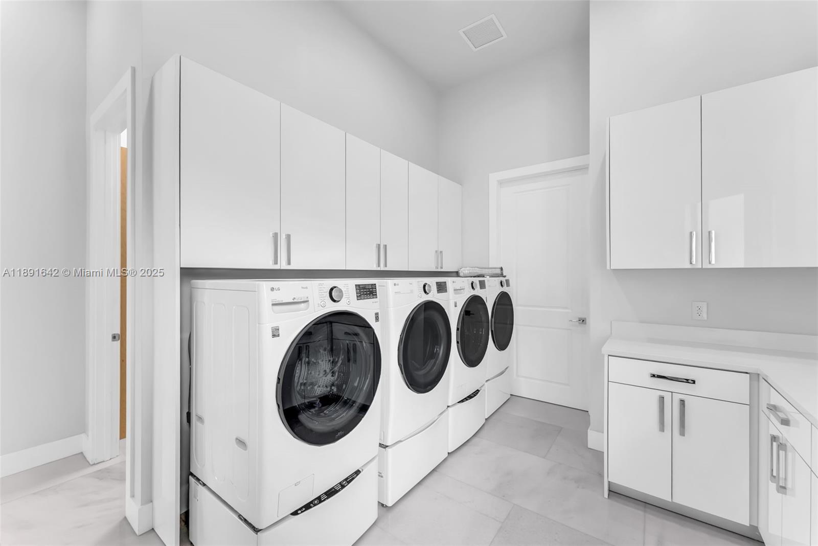 12175 Southwest 45th Street Miami, FL 33175 - Photo 34 of 58 a utility room with dryer and washer
