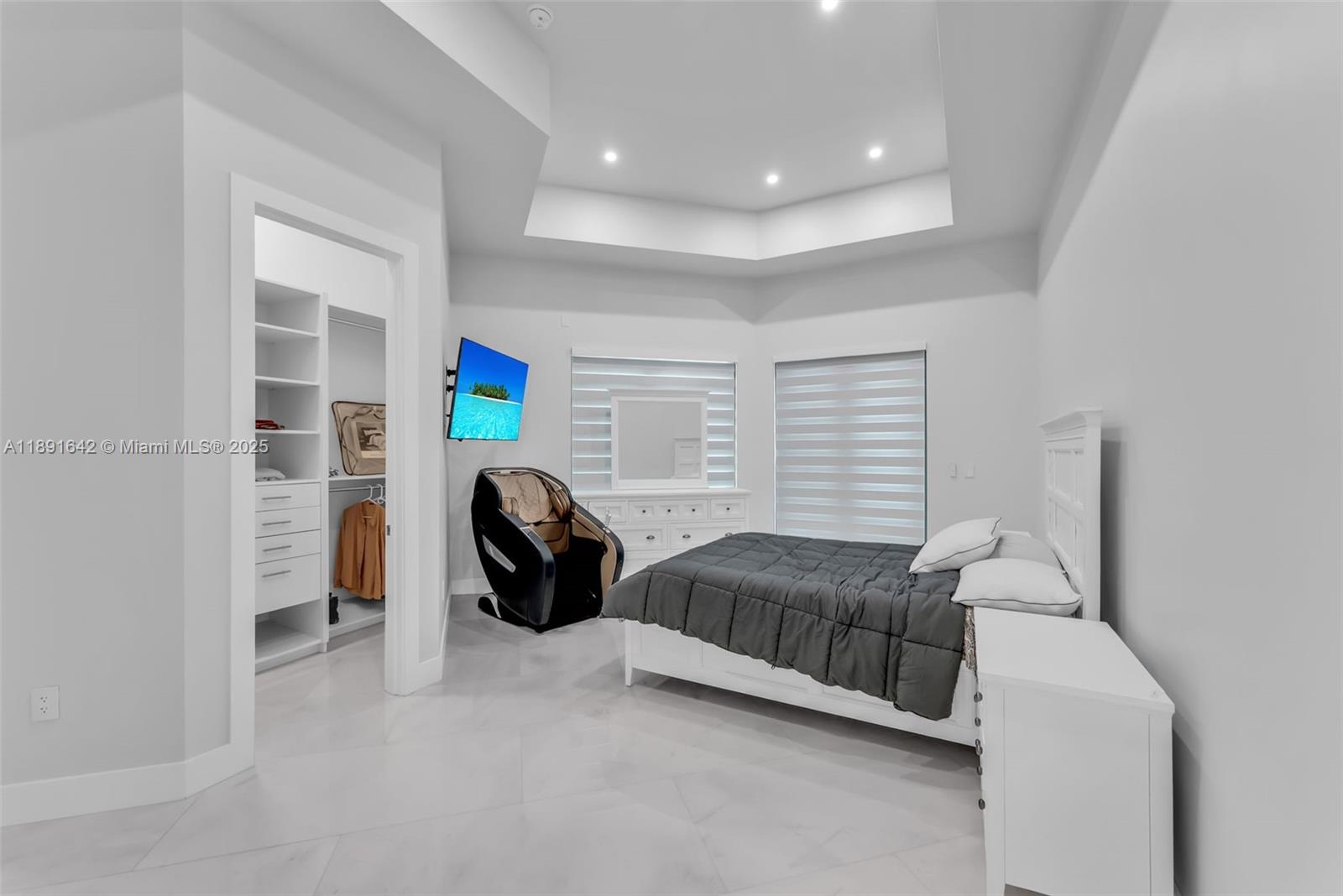 12175 Southwest 45th Street Miami, FL 33175 - Photo 36 of 58 a bedroom with a bed and a window