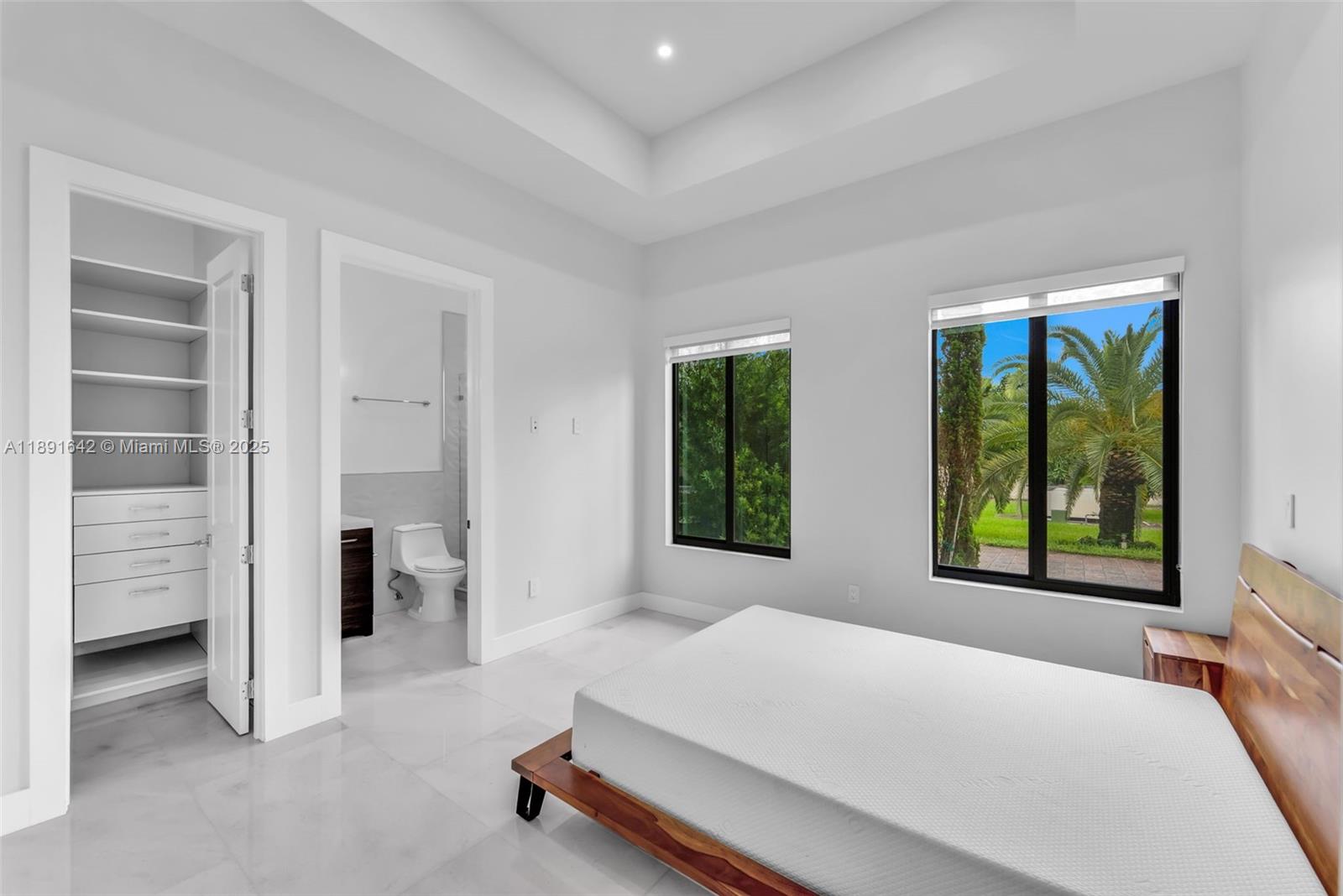 12175 Southwest 45th Street Miami, FL 33175 - Photo 38 of 58 a room with a bed and a window