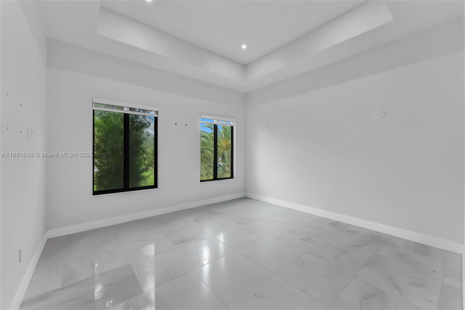 12175 Southwest 45th Street Miami, FL 33175 - Photo 40 of 58 an empty room with windows