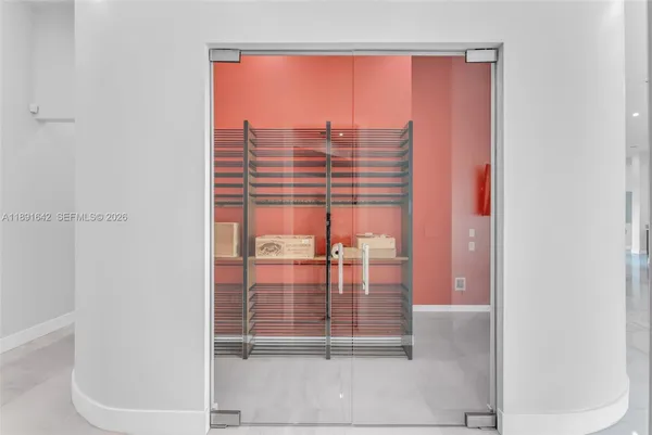 a bathroom with a sink toilet vanity and shower