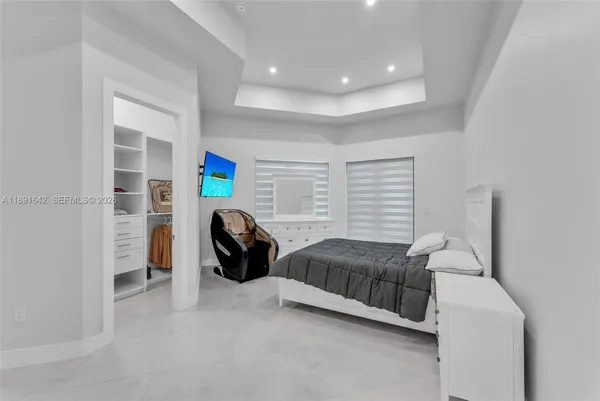 a view of an empty room with windows and yard