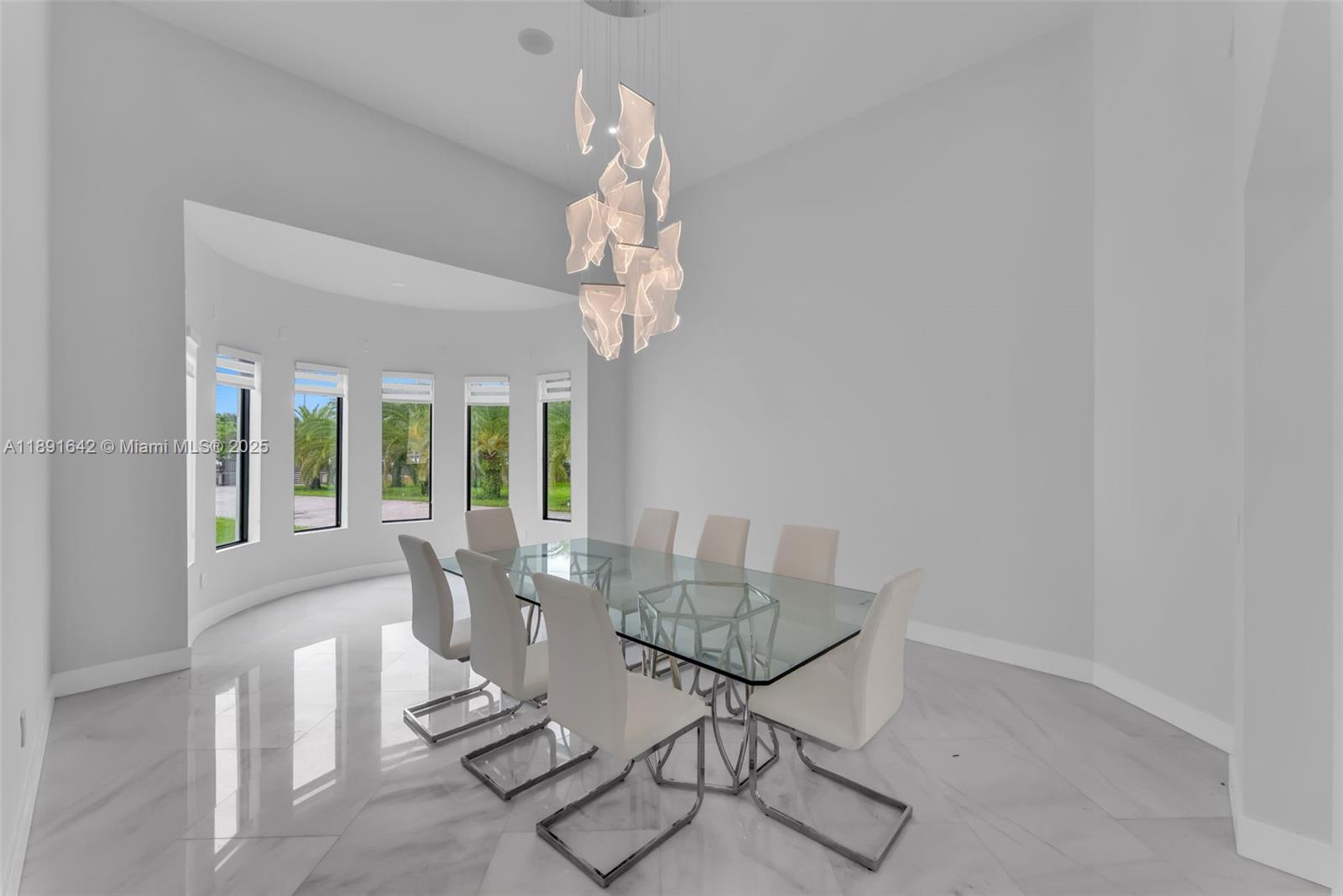 12175 Southwest 45th Street Miami, FL 33175 - Photo 10 of 58 a dining room with furniture and window