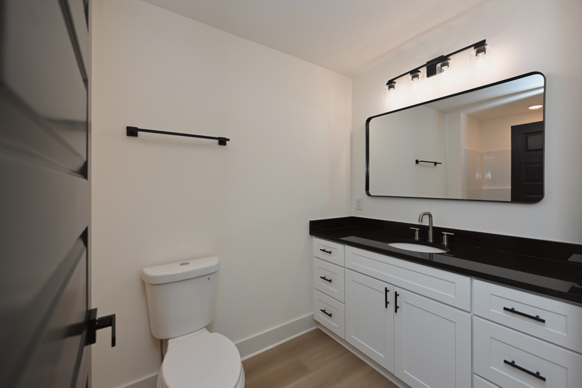 1613 Elizabeth Road Nashville, TN 37218 - Photo 6 of 14 a bathroom with a toilet sink and mirror