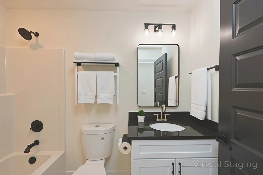 1613 Elizabeth Road Nashville, TN 37218 - Photo 9 of 14 a bathroom with a granite countertop sink a toilet a mirror and shower