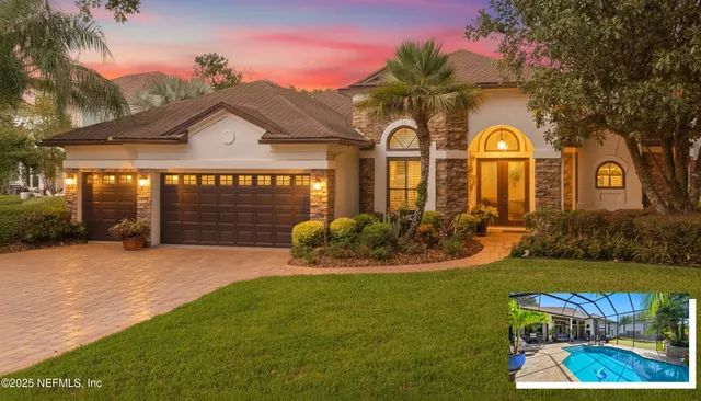 a front view of a house with garden