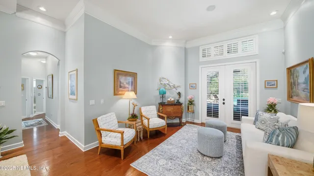 a bathroom with a double vanity sink mirror double and bathtub
