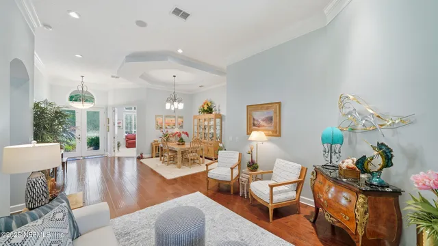 a spacious bathroom with a sink a mirror and a bathtub