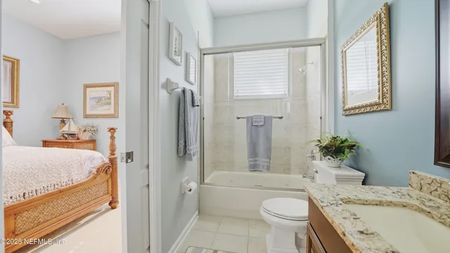 a view of an outdoor dining space with a table and chairs
