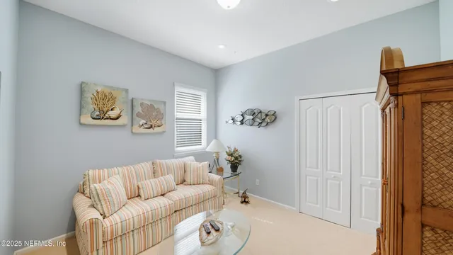 a view of a swimming pool and trees in the background