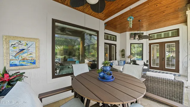 an aerial view of a house with yard swimming pool and outdoor seating