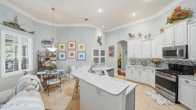 a living room with furniture and a couch