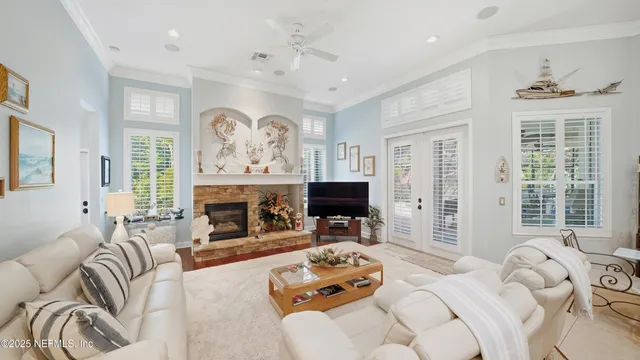 a bedroom with a large bed and a couch