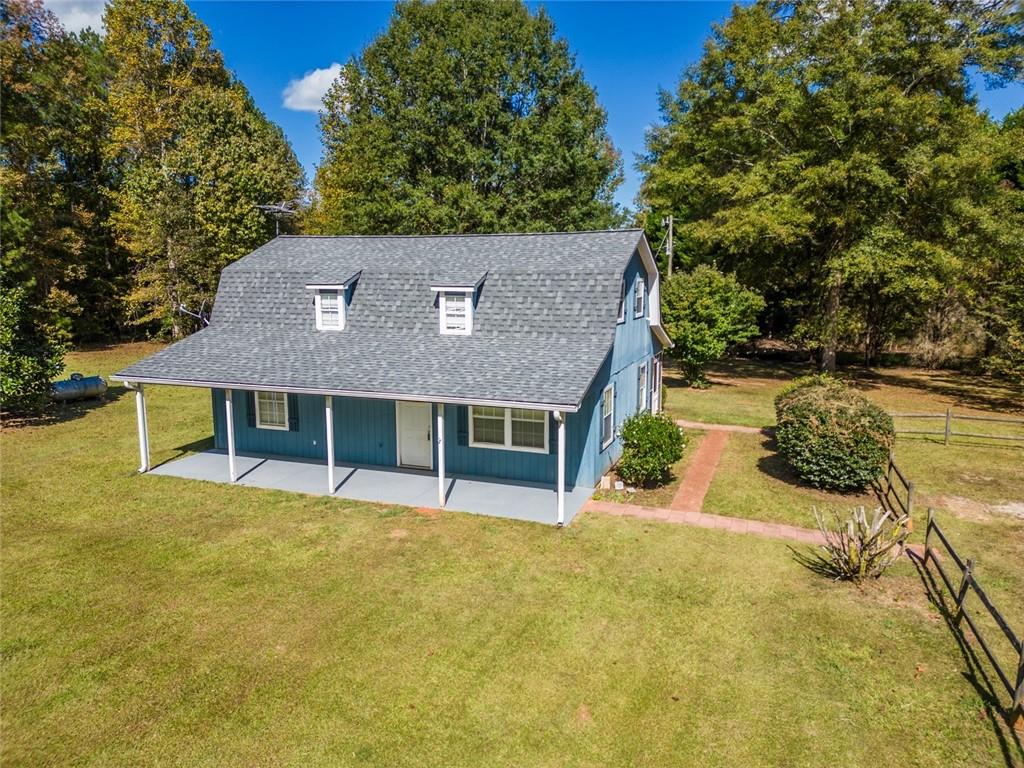 front view of a house with a yard
