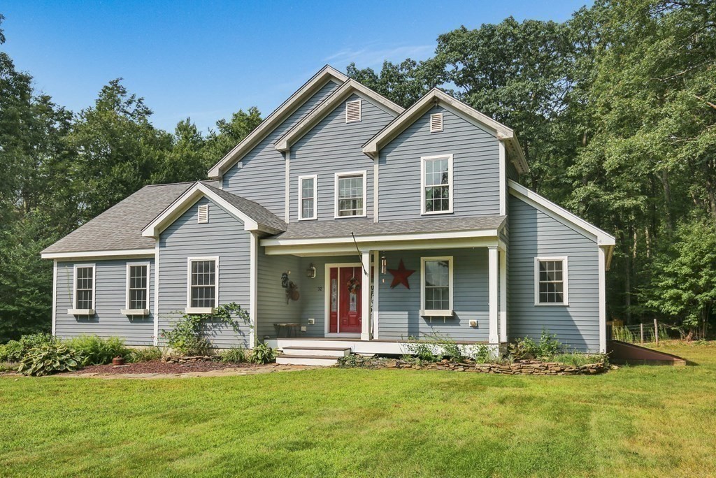 32 Webber Road Brookfield, MA 01506 - Photo 1 of 42 a front view of a house with a yard