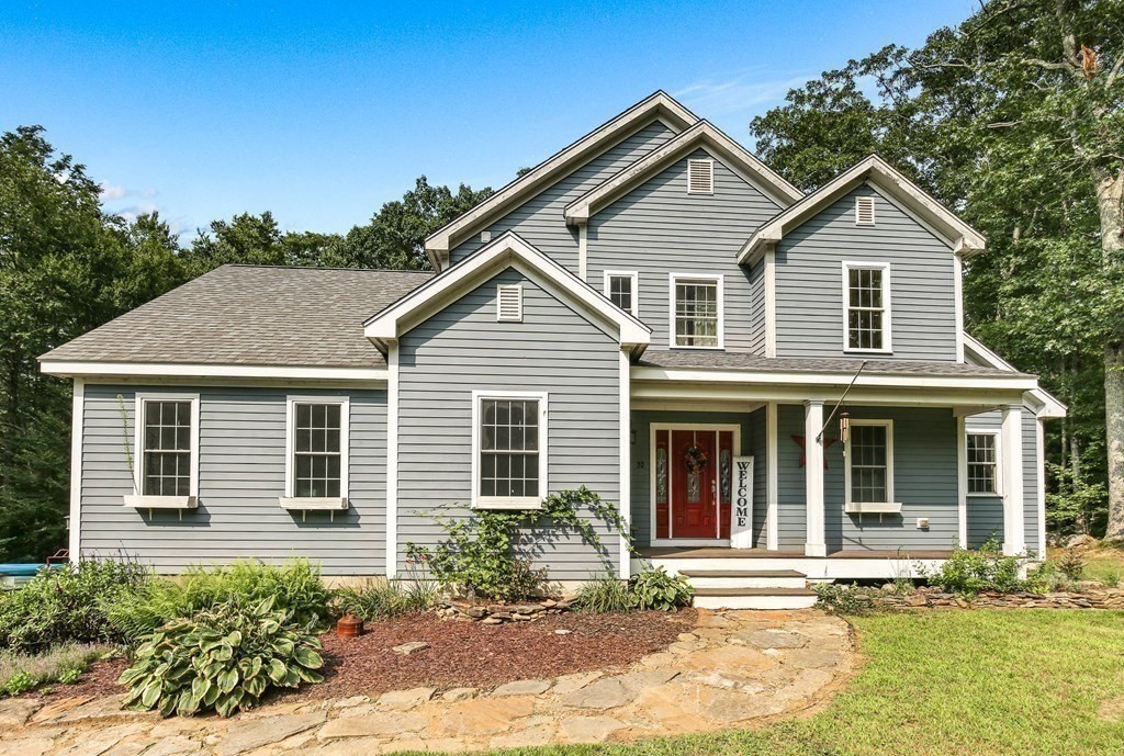 32 Webber Road Brookfield, MA 01506 - Photo 39 of 42 a front view of a house with a yard