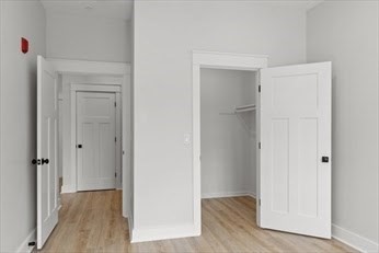 843 Main Street, Unit 104 Clinton, MA 01510 - Photo 11 of 19 a view of hallway with wooden floor