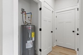 843 Main Street, Unit 104 Clinton, MA 01510 - Photo 19 of 19 a view of an entryway with wooden floor