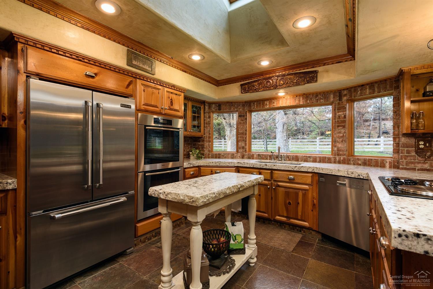 20190 Glen Vista Road Bend, OR 97703 - Photo 5 of 25 Chef's kitchen has stainless steel appli