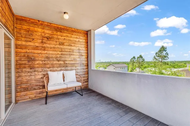 a bathroom with a shower and a sink
