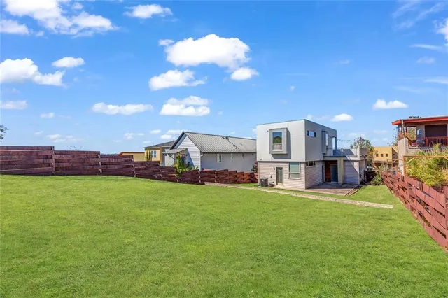 a bathroom with a sink toilet and mirror