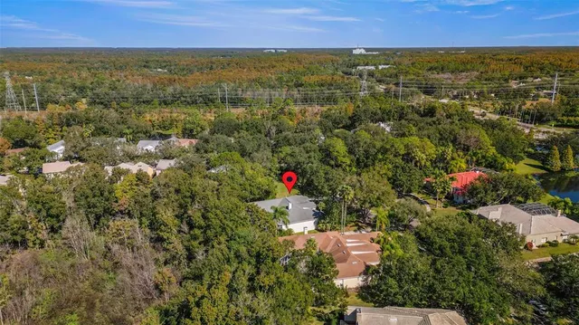a view of city and green space