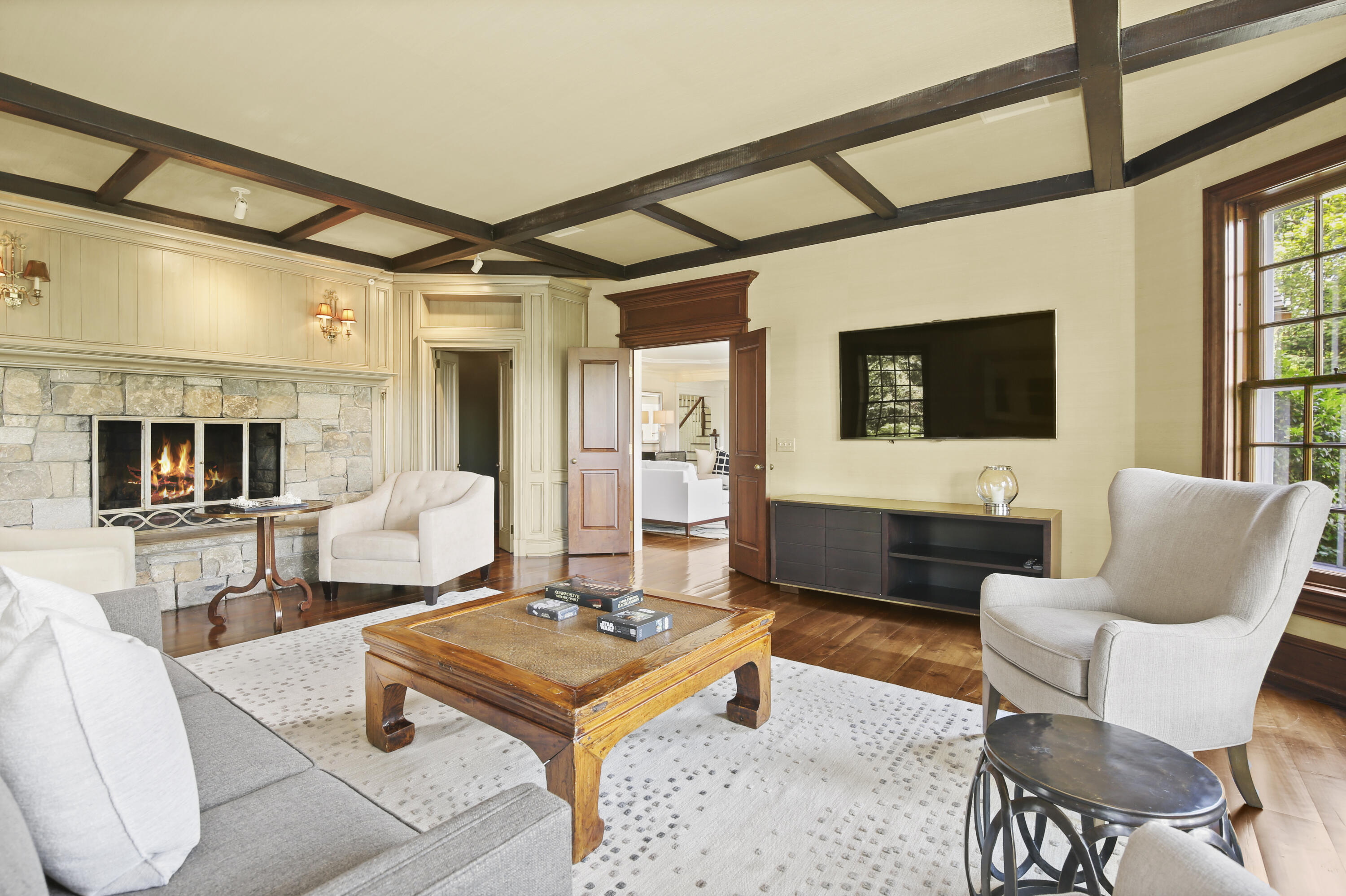 707 West Road New Canaan, CT 06840 - Photo 11 of 58 a living room with furniture and a flat screen tv