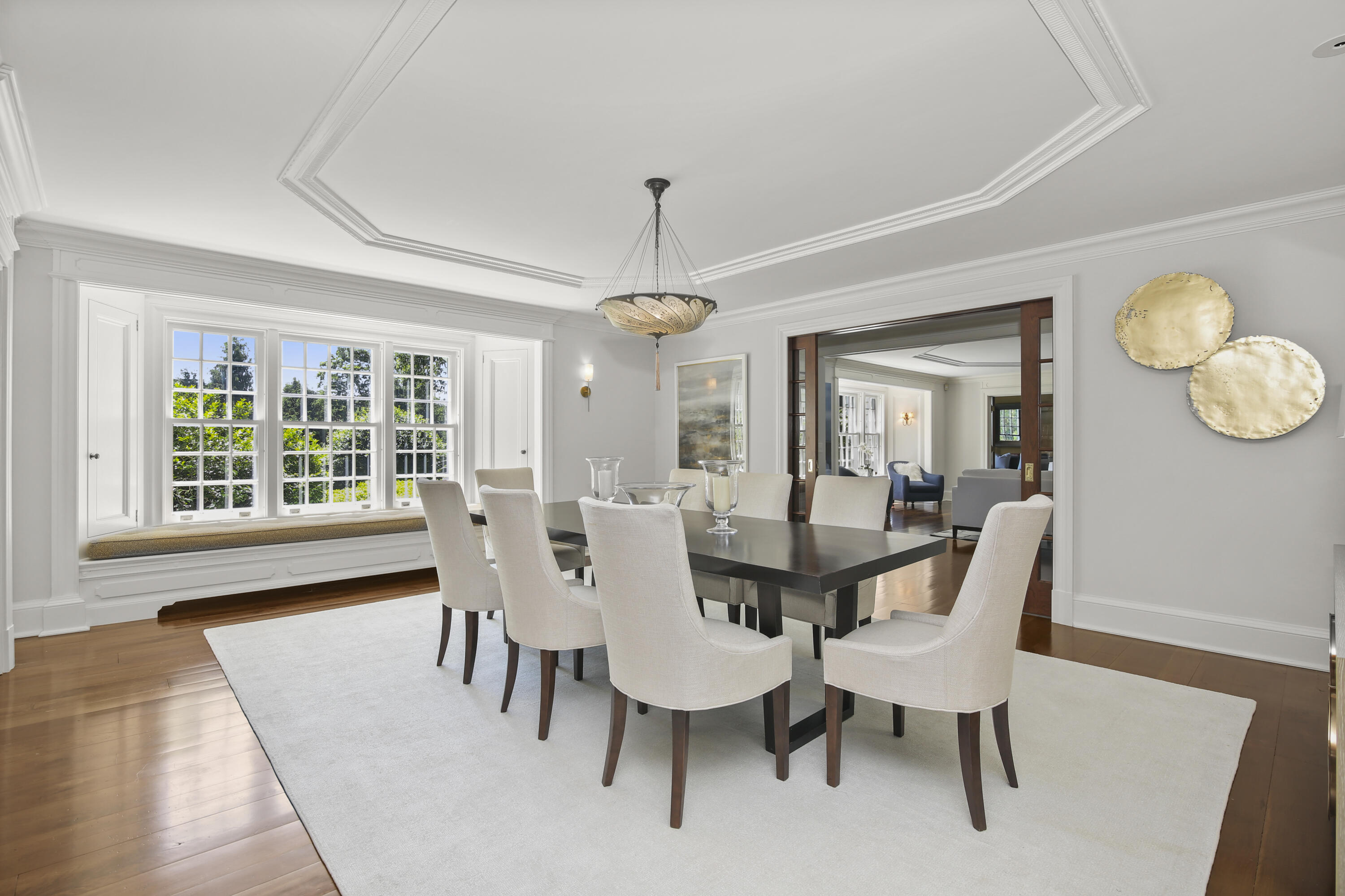 707 West Road New Canaan, CT 06840 - Photo 13 of 58 a view of a dining room with furniture window and wooden floor