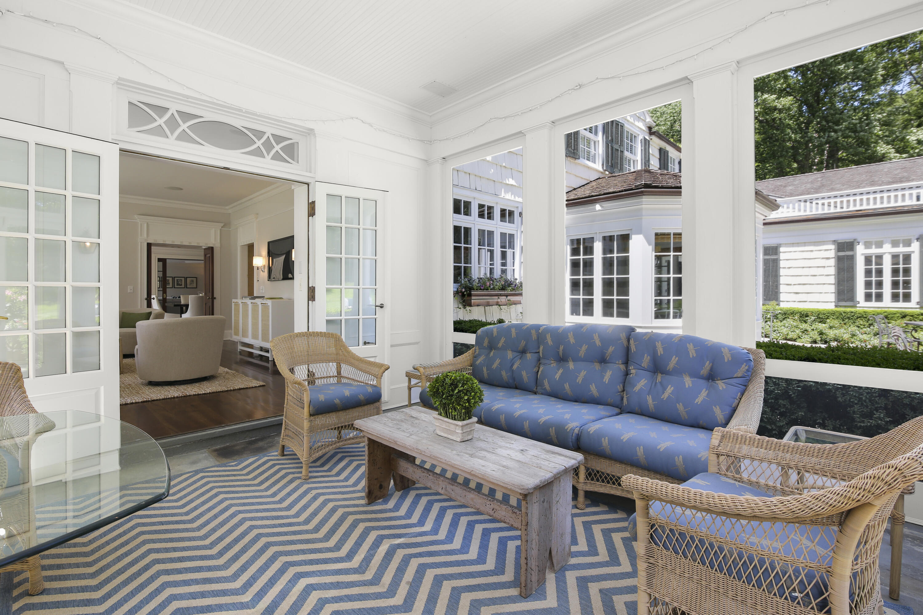 707 West Road New Canaan, CT 06840 - Photo 17 of 58 a living room with furniture and a potted plant