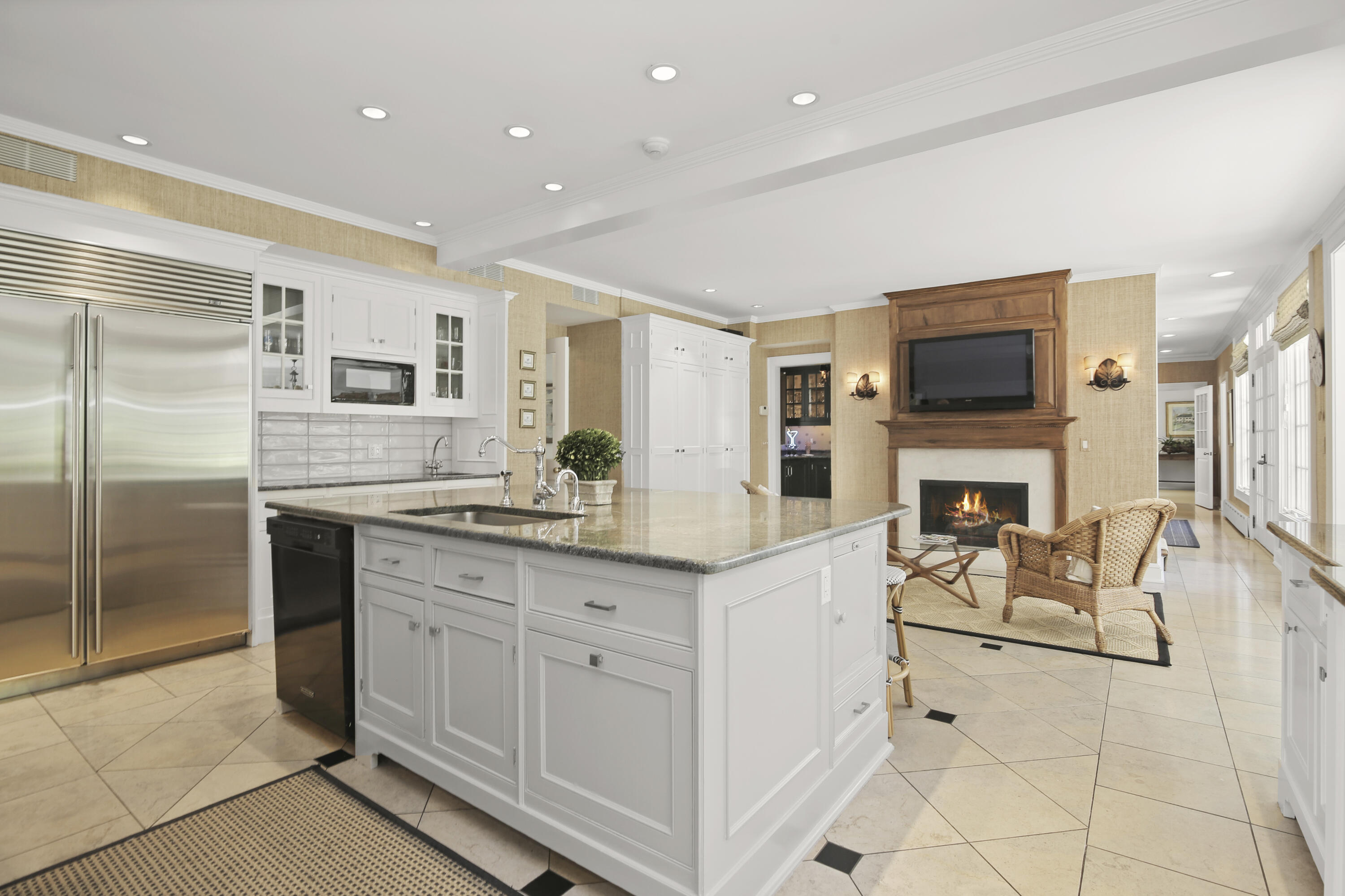 707 West Road New Canaan, CT 06840 - Photo 20 of 58 a spacious kitchen with stainless steel appliances granite countertop a refrigerator and a stove top oven