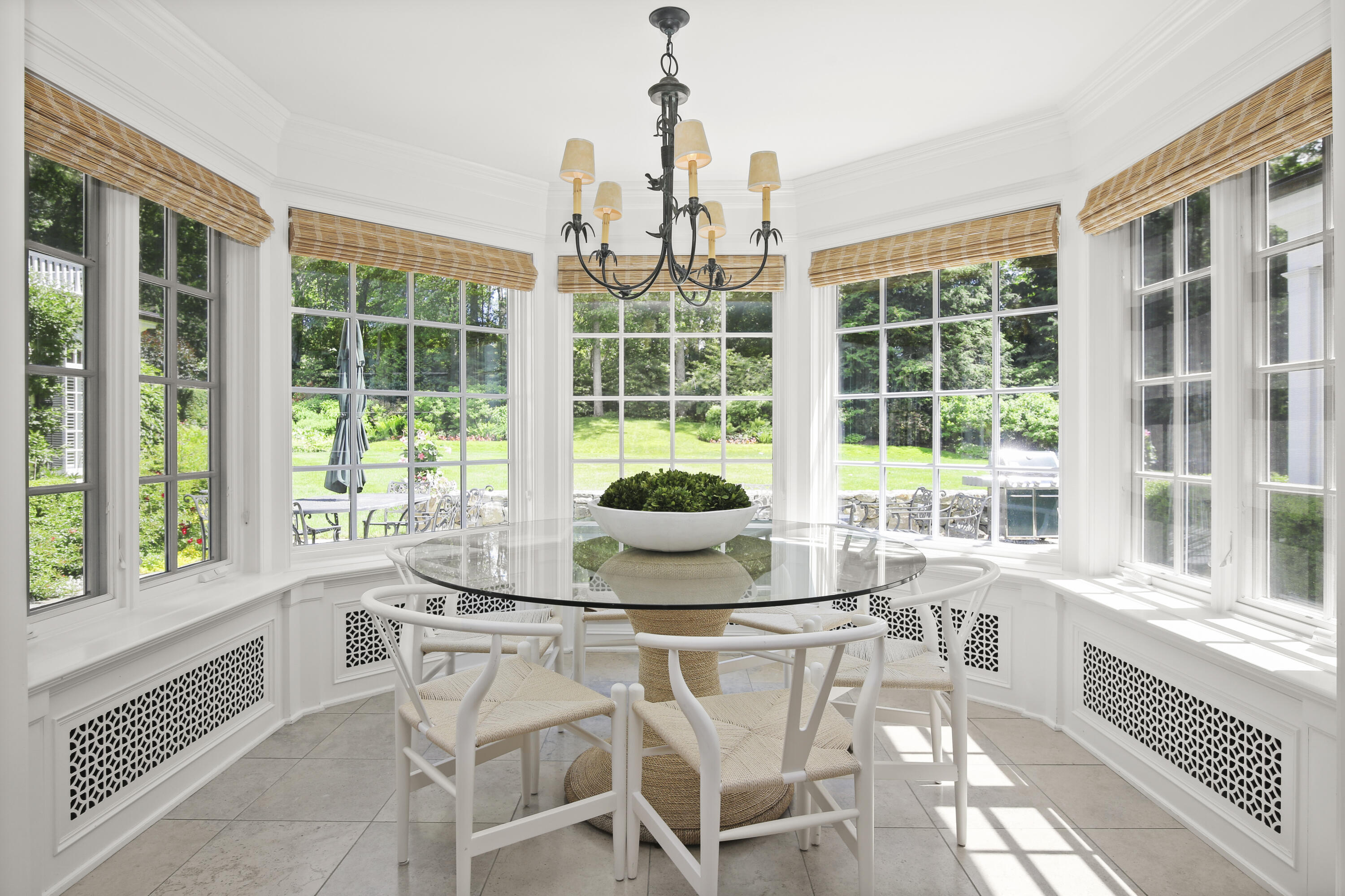 707 West Road New Canaan, CT 06840 - Photo 22 of 58 a view of a dining room with furniture window and outside view