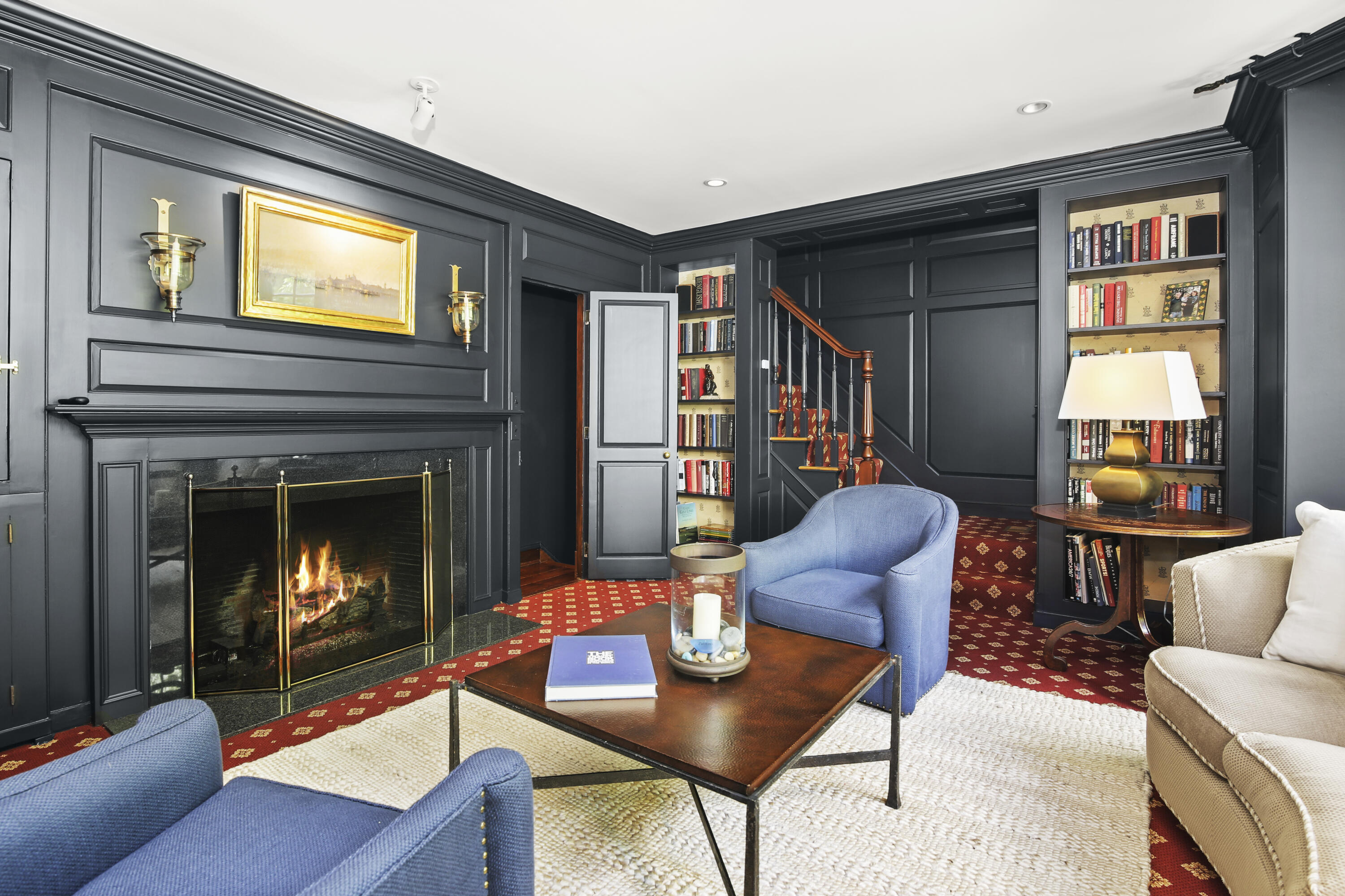 707 West Road New Canaan, CT 06840 - Photo 26 of 58 a living room with furniture and a fireplace
