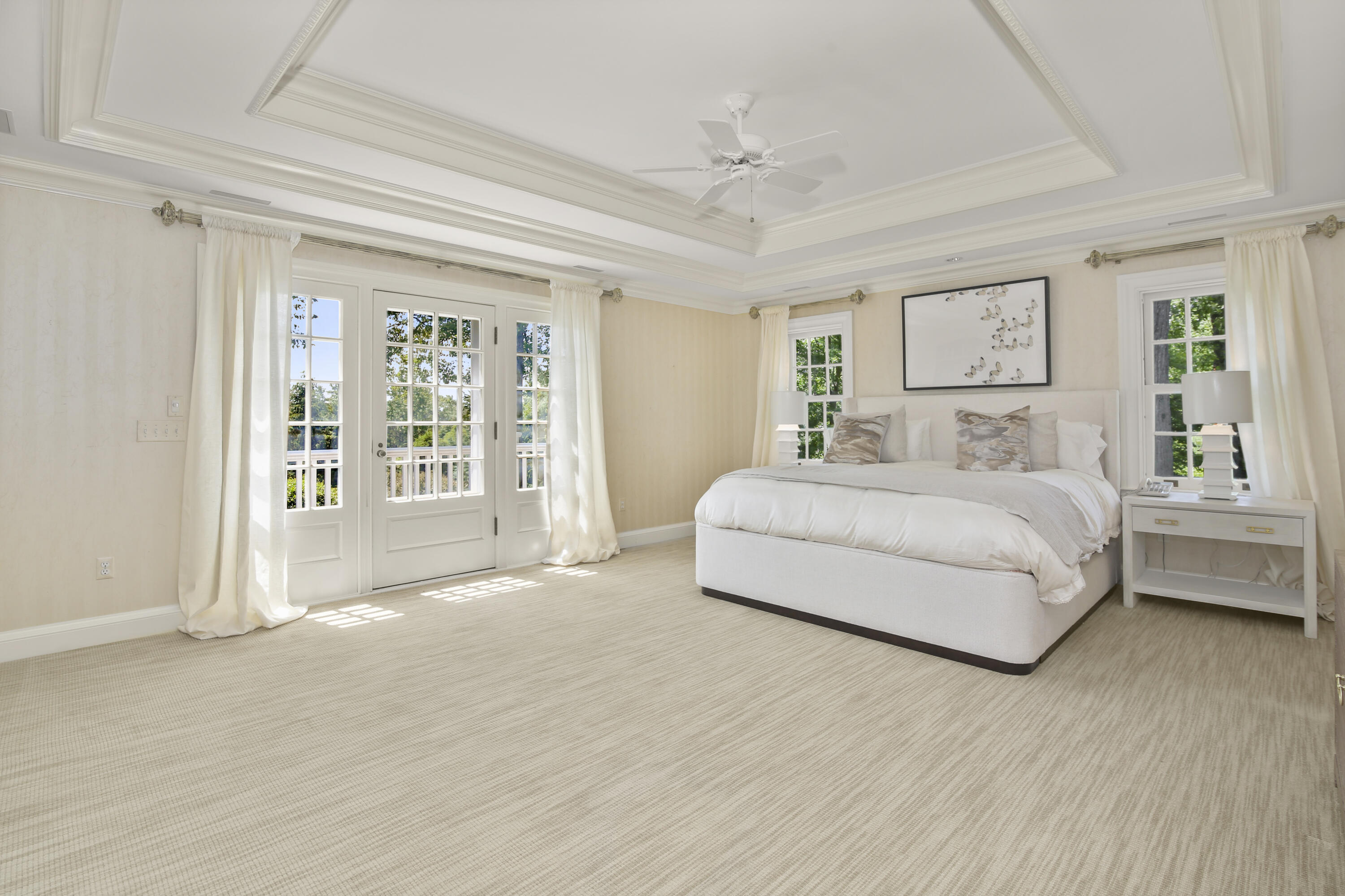 707 West Road New Canaan, CT 06840 - Photo 33 of 58 a spacious bedroom with a large bed and a window